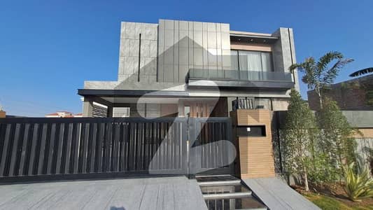 One Kanal Slightly Used Ultra Modern Designer Owner Build Fully Furnished Bungalow 25KV Solar Installed For Sale At Prime Location Of DHA Lahore Near To Park Masjid & Commercial Market.