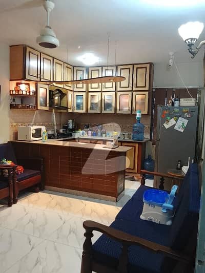 Neat And Clean 2 Bed DD Flat For Sale In Gulistan E Jauhar Block 18. Ground + Extra Land.