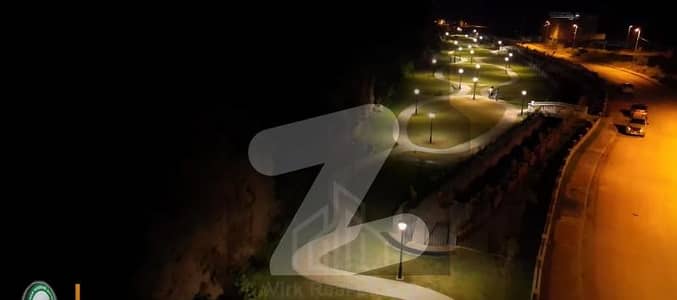 8 Marla Heighted & Non-Corner Plot For Sale On (Urgent Basis) On (Investor Rate) In Sector B Near Family Park In DHA 03 Islamabad