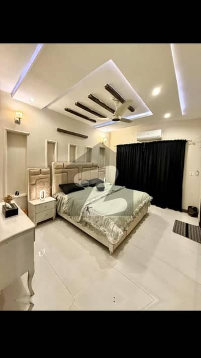 Stunning 8-Marla Modern Bungalow for Rent in DHA Phase 9 Town Built with High-Quality Construction Material, Elegant Ceiling Design, 5 Master Bedrooms & Dual Company Kitchens