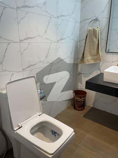 Luxuriously Furnished 1-Bedroom Apartment for Rent - DHA Phase 6, Prime Location.