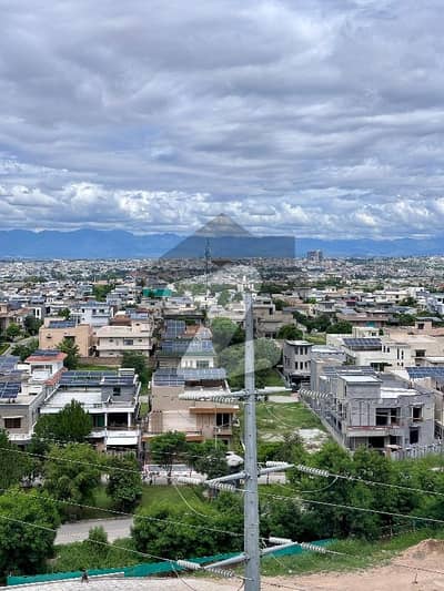 1 kanal south facing plot prime location walking distance from park and masjid also commercial &direct access from Dha expressway