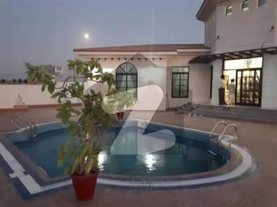 2000 Square Yards Farm House Ideally Situated In DHA City Karachi