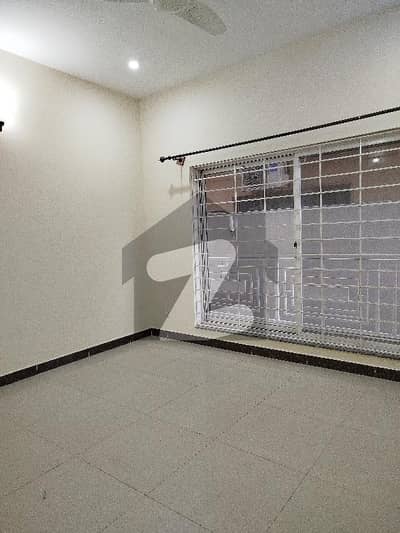 E-11 Kanal Ground Portion Having 3 Bedrooms Attached Washrooms DD Tv Lounge Kitchen Car Parking Separate Meters Separate Gate Rent 2 Lac