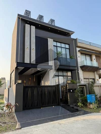 5 Marla Luxury House for Sale   Lake City Meadows (Near DHA Phase 5)  Demand: 2.40 Crore (DM for best deal)  5 Marla | 4 Bed | Modern Design  Features:  4 Spacious Bedrooms with Attached Baths  2 Stylish Kitchens  TV Lounge + Drawing Room  Modern Spanish / Luxury Finish  Solid Construction + Tile Flooring  Car Parking Space  Peaceful & Prime Location  Serious buyers only DM for details & visit  Contact: Awais Malik  03403020344