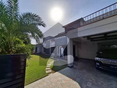 2 KANAL ELEGANT AND FULLY MAINTAINED SUPER HOT LOCATED BUNGALOW IS AVAILABLE IN THE BEST BLOCK OF DHA LAHORE. ORIGINAL PICTURES ATTACHED