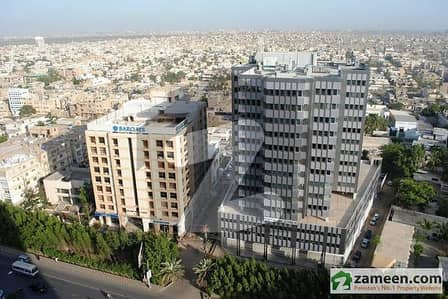 main shahrah e faisal Awsome location Ground plus 15 building 300000 sq ft area plot size 3250 sq yards