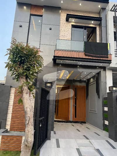 3 marla Beautiful house with a roof top swimming pool for sale al kabir town