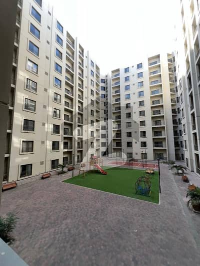 1400sq ft 2BHK Luxurious Apartment in Paragon Towers is available for RENT Near Precinct-17.5min Drive from Main Gate of Bahria Town Karachi