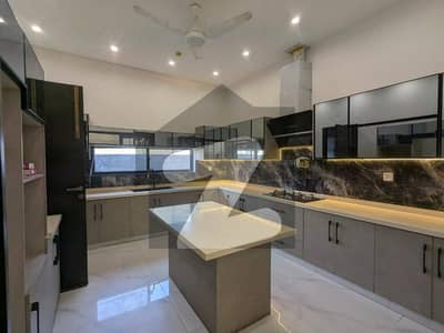 10 Marla House Available For Rent In Quaid Block Sector E Bahria Town Lahore