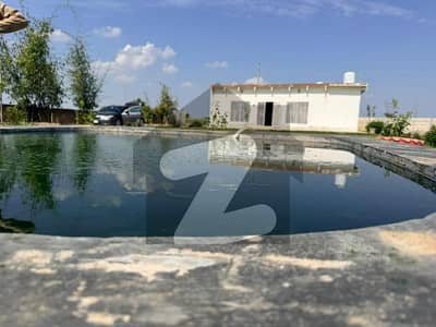 جھلم روڈ چکوال میں 2 کمروں کا 10 کنال فارم ہاؤس 2.0 کروڑ میں برائے فروخت۔