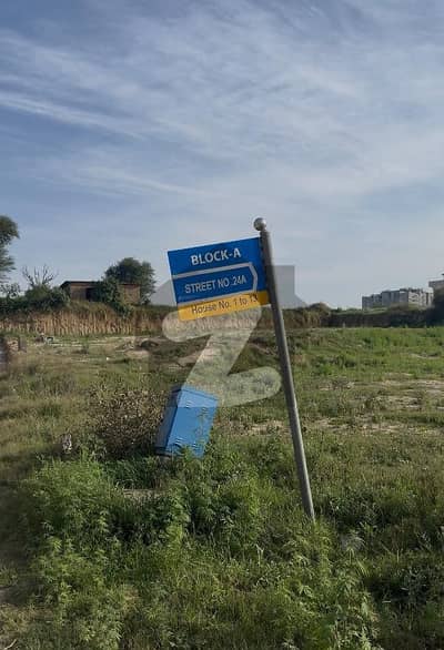 UNIVERSITY TOWN BLOCK A 35*65 2nd CORNAR PLOT FOR SALE ON GOOD LOCATION FIRST COME FIRST AVIL THIS BIG OPERTUINTY