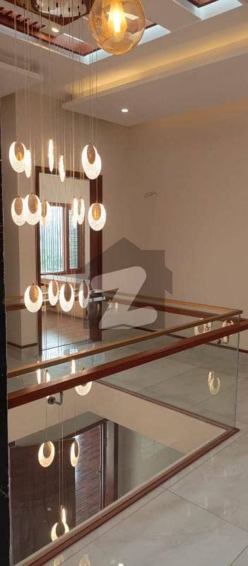 BUNGALOW FOR SALE BRAND NEW & BEAUTIFUL 500 YARDS 1+4 BEDROOM WITH BATH DRAWING ROOM WITH BATH 2 TV LOUNGE 2 KITCHEN BASEMENT SERVANT ROOM IMPORTED LIFT