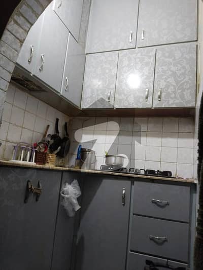 2 BED DD PORTION IN KARIMABAD FOR SALE