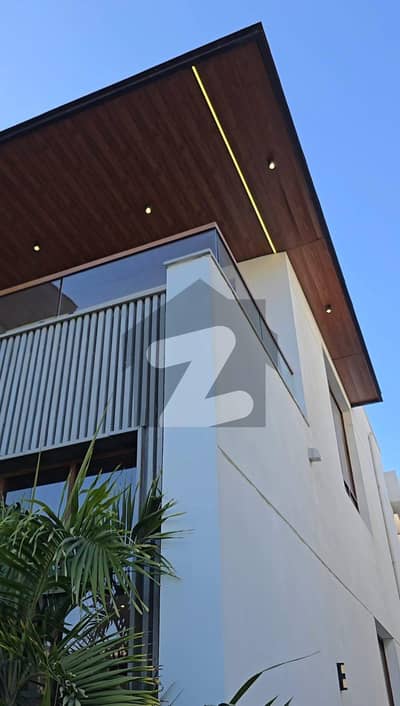 1000 Yards Brand New Bungalow With Lift Pool Basement Top Quality Construction Available For Sale