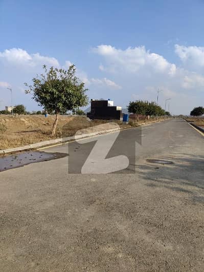 6.50 Marla On Ground Plot Carpeted Road A Block Phase 4 Location All Dues Paid