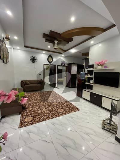 FOR SALE 3 BED PORTION (PENTHOUSE STYLE) Location: Block 12/11 Dividing Road (Main Road, VIP Location) Portion: 3rd Floor With Roof Size: 300 Sq. Yards