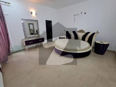 1 Kanal Elegant And Fully Furnished Super Hot Located Bungalow Is Available In The Best Block Of DHA Phase 6 Lahore.