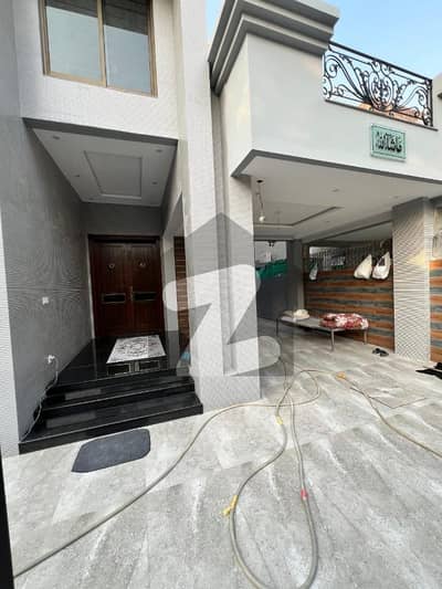 10 MARLA ELEGANT AND FULLY MAINTAINED SUPER HOT LOCATED BUNGALOW IS AVAILABLE IN THE BEST BLOCK OF DHA LAHORE.