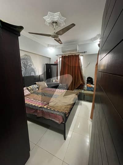 Two bed lounge apartment for sale in DHA phase 6 on reasonable price.