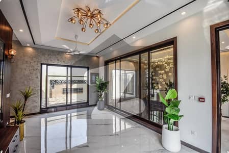 1 KANAL ELEGANT AND FULLY MAINTAINED SUPER HOT LOCATED BUNGALOW IS AVAILABLE IN THE BEST BLOCK OF DHA PHASE 6 LAHORE.