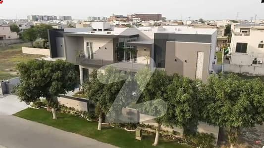 2 KANAL ELEGANT AND FULLY MAINTAINED SUPER HOT LOCATED BUNGALOW IS AVAILABLE IN THE BEST BLOCK OF DHA PHASE 5 LAHORE.