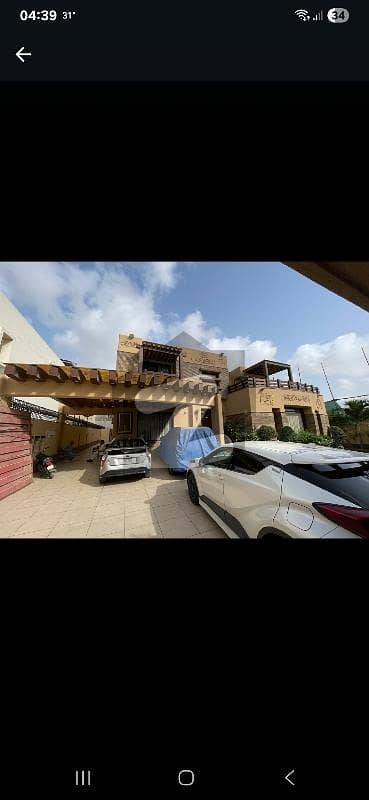Defence VI 1000 yards 6 bedrooms drawing with swimmimg poool / Basement / home theatre Spanish tiled flooring Italian bath Ashrays kitchen architect designed 10 years old very well maintained prime location