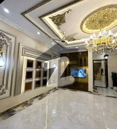 10 Marla Brand New House In Overseas B Block Bahria Town Lahore