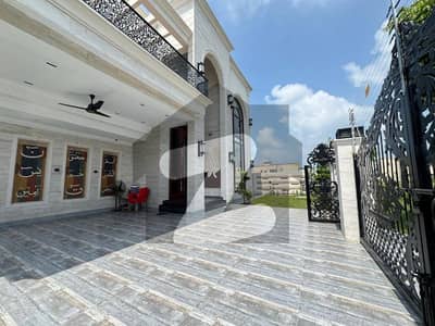Luxury Living Redefined Brand New 1 Kanal House for Sale in DHA Phase 7 Featuring 5 Spacious Bedrooms with Attached Baths, Drawing Dining, Double TV Lounges & Servant Quarters at a Prime Location