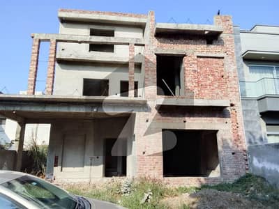 10 Marla FOR SALE House Grey Structure IN DHA Rahbar Phase 1 D Block Starting Good Location