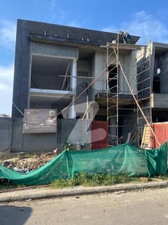 10 Marla Single Unit House For Sale In DHA 2 Islamabad  On Double Road . Second To Corner .
