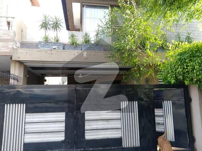 Top Location On 70-Feet Road Lightly Used 10 Marla Bungalow With Full Basement Facing 2 Kanal Very Close To Wateen Chowk