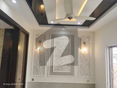 10 Marla Like Brand New House Available For Rent In Bahria Town Lahore.