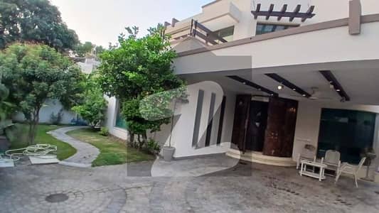 NEAR TO PARK AND COMMERCIAL 20 MARLA ELEGANT AND FULLY MAINTAINED SUPER HOT LOCATED BUNGALOW IS AVAILABLE IN THE BEST BLOCK OF DHA LAHORE.
