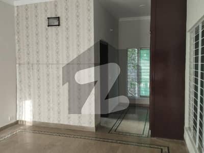 DHA Phase 4 10 Marla House for Rent, perfect for comfortable family living in a prime and peaceful location.