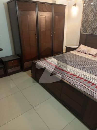 Two-bedroom flat available for sale in a boundary wall project near Baqai University, in front of Malir Cantt Road, with easy access to the M9 Motorway