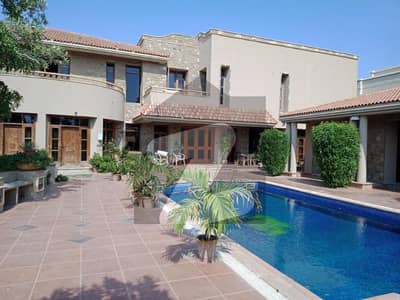 Luxurious 2000 Yards Bungalow with Pool Prime Phase VI Near Khyaban-e-Hafiz!