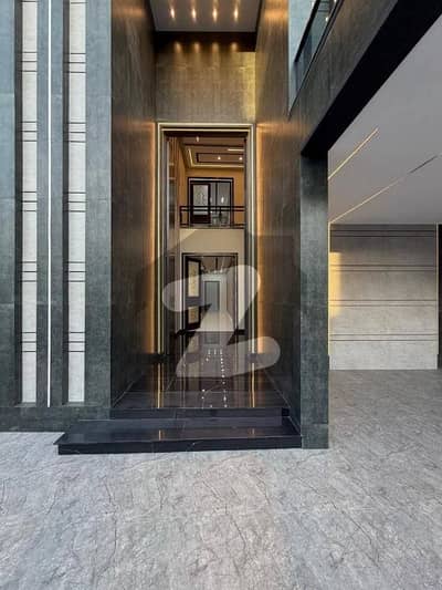 1 Kanal Brand New luxury modern same furnished house available for rent in DHA phase 6 sector-D Lahore. facing main road 1 ment distance dolmen Mall. only Rent [325,000]PKR