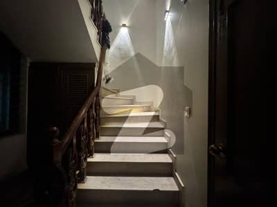1 kanal owner build house almost Good condition double story house 5 bed tile flooring double kitchen Best for investment purposes  Best for families