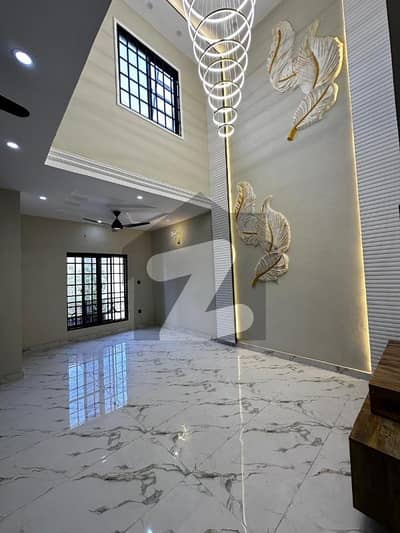 5 Marla brand new triple story house for sale in Eden boulevard society college road Lahore