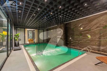 25 MARLA MAZHAR MUNIR DESIGN FULL BASEMENT ULTRA MODERN FULLY FURNISHED BUNGALOW WITH INDOOR SWIMMING POOL, HOME CENIMA,LIFT AND DOUBLE HEIGHTED TV LOUNGE FOR SALE IN DHA PHASE 5 NEAR TO PARK.