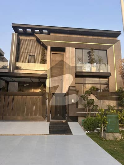 1 KANAL ELEGANT AND BRAND NEW DESIGNER SUPER HOT LOCATED BUNGALOW IS AVAILABLE IN THE BEST BLOCK OF DHA LAHORE.
