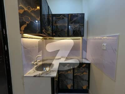 450 Square Feet Flat available for sale in Muslim Commercial Area if you hurry