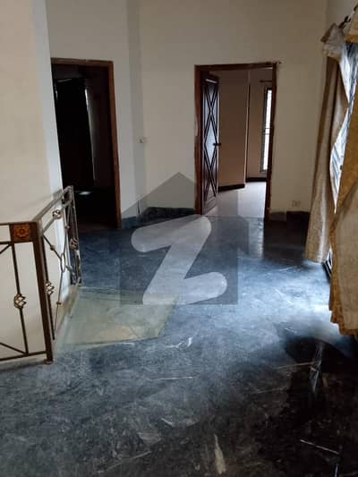 DHA Phase 4 10 Marla House For Rent, Ideal For Comfortable Family Living In A Prime And Peaceful Location.