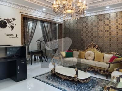 14 Marla lavish furnished house available for Rent in new garden town shersha block.