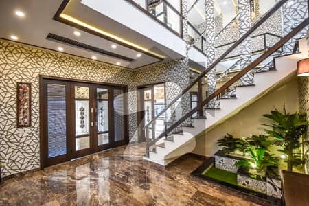 A Beautifully Designed 5 Marla House With A Stunning Ultra-Modern Elevation, Located In The Prime Area Of DHA 9 Town C Block.