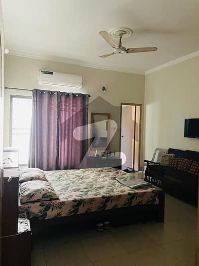 12 Marla Upper Portion for Rent in A2 Block Johar Town Lahore Facing Park Near Boulevard, Expo Center, Emporium Mall, schools, hospitals, and restaurants.