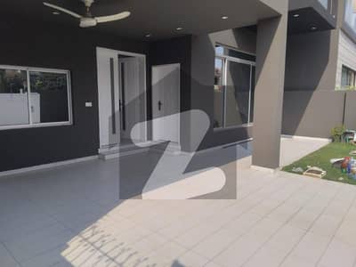 DHA Phase 4 10 Marla House for Rent, Prime Location, Ideal Family Living with Modern Comforts.