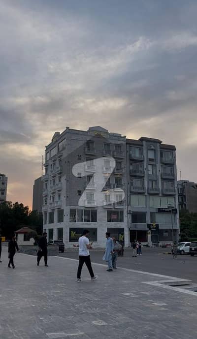 8 MARLA CORNER HOT LOCATION COMMERCIAL PLAZA FACING EIFFEL TOWER FOR SALE WITH 15 LAC RENTAL INCOME IN QUAID BLOCK- BAHRIA TOWN LAHORE