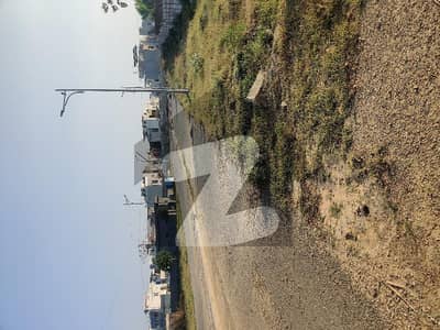 Residential Plot for Sale in DHA Phase 9-Town (Block E) Prime Location Investment Opportunity with High Future Value by Wall Green Realtors